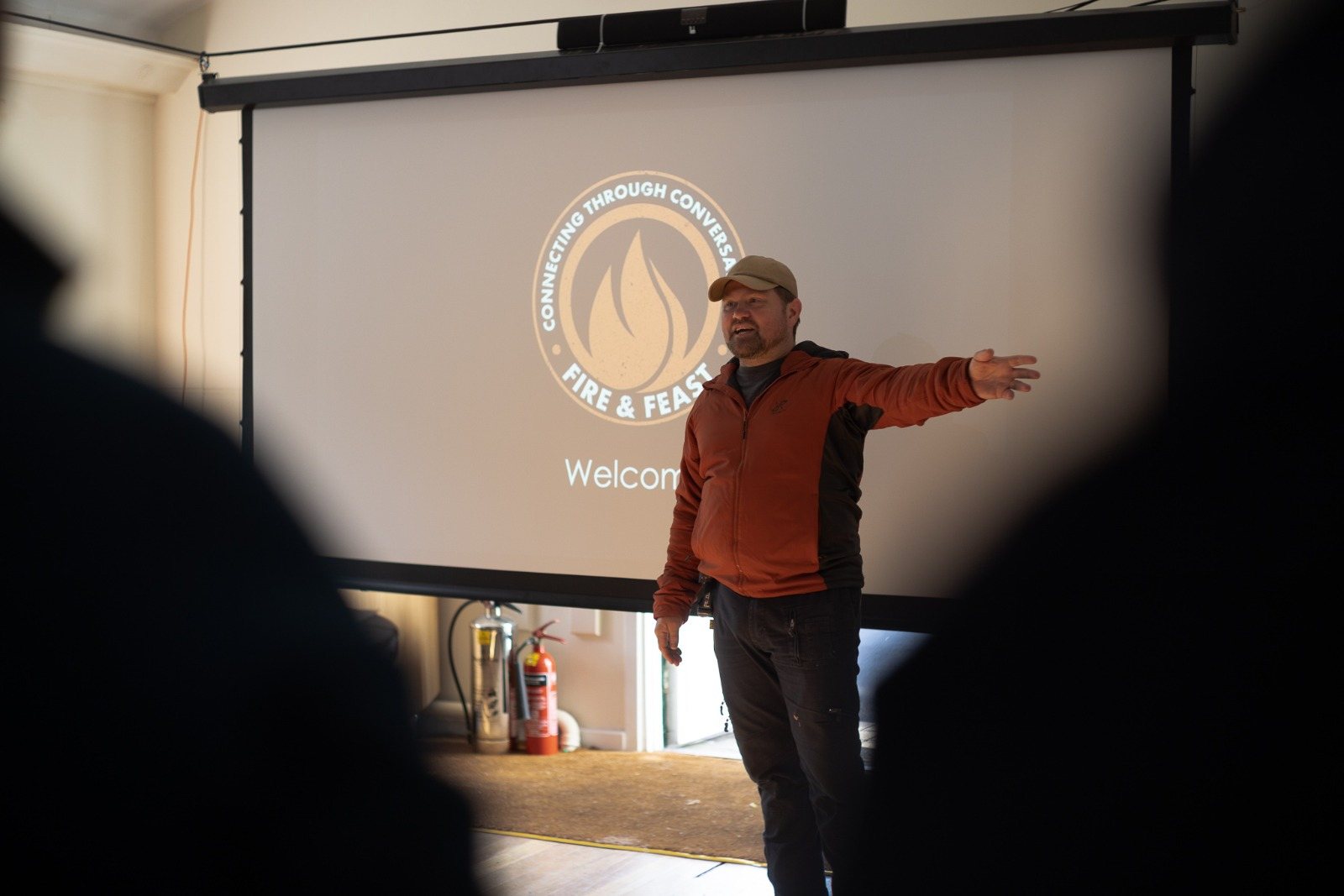 Dan Cooke speaking at a live event